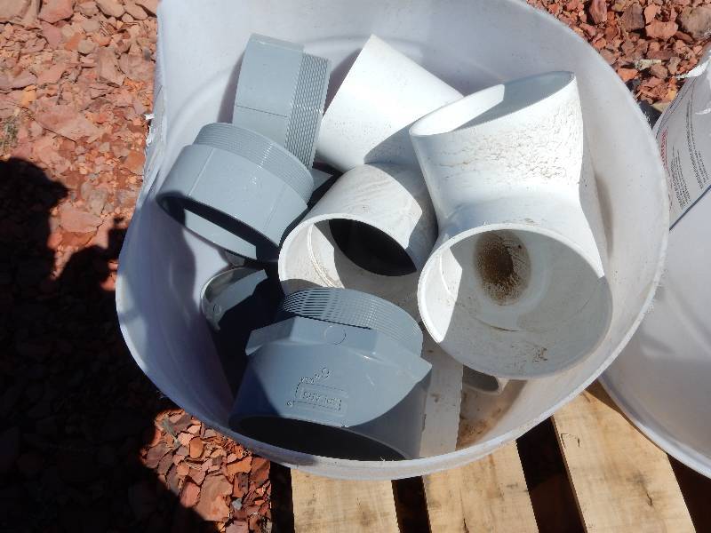 lot 181 image: 12 barrel of 6 in pipe hangers 6in 45 degree PVC elbows and adapters