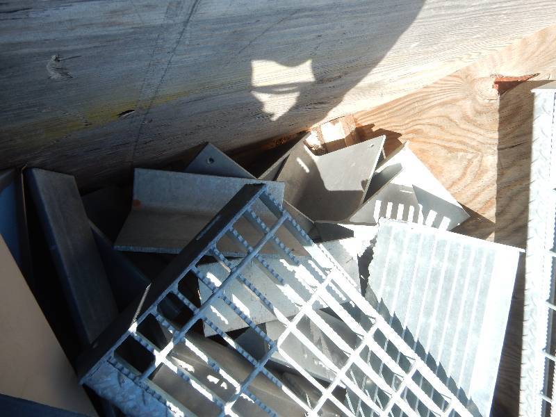 lot 192 image: Galvanized Grated Stair Treads.