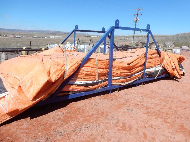 lot 6 image: Approx 60, 8ft x 20 ft insulated blankets and Rack