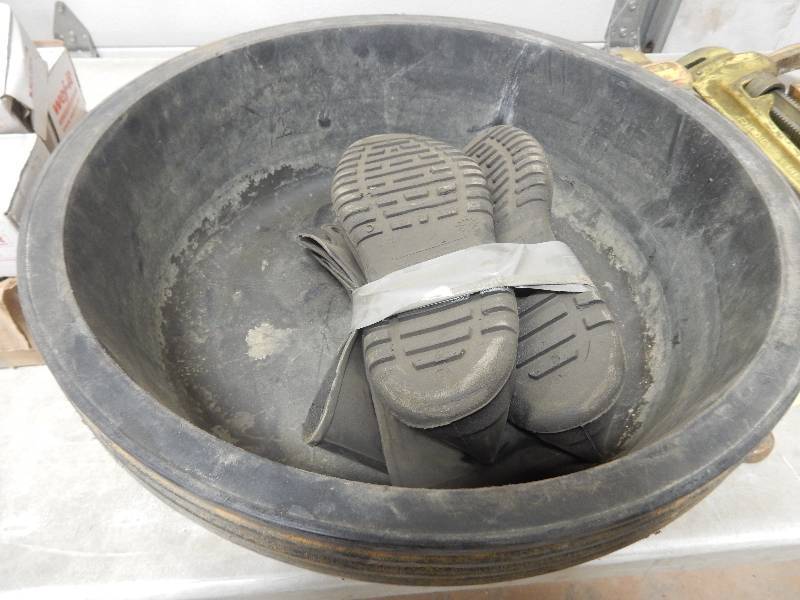lot 254 image: 4 heavy black plastic wash basins  Pair of size 13 hi top boots