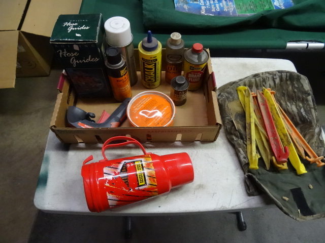 lot 33 image: Coffee cup. Car wax. Tent stakes. H...