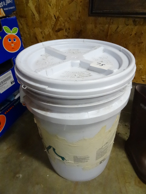 lot 75 image: 7 Gal pail with lid....