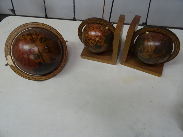 lot 81 image: 2 globe book ends. Decorative globe...
