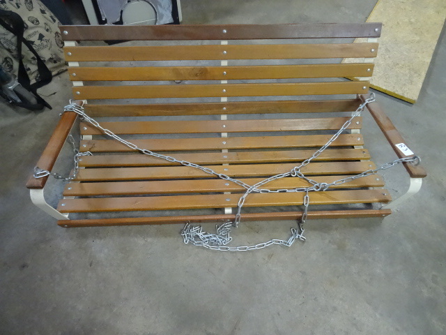 lot 83 image: Hanging porch swing. Metal frame. W...