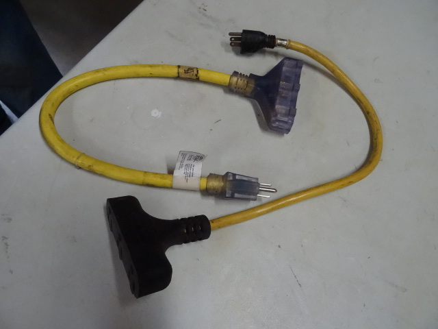 lot 135 image: 2 tri tap extension cords...
