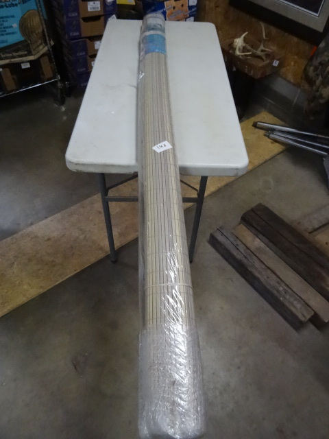lot 140 image: PVC roll up shade. Wood grain. New....