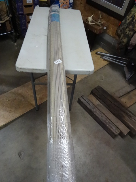 lot 141 image: PVC roll up shade. Wood grain. New....