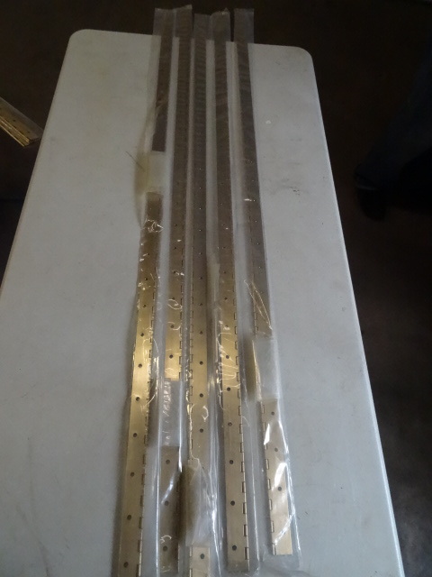 lot 176 image: 5 sets of 48 piano hinges. With sc...