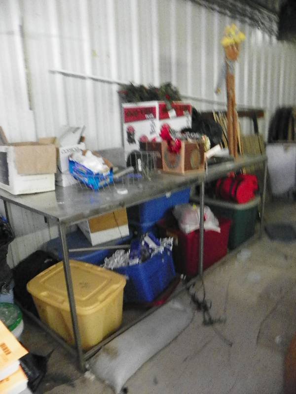 lot 6 image: Stainless Steel counter  work space. Includes contents of seasonal items. 8 long x 37 tall x 40 deep