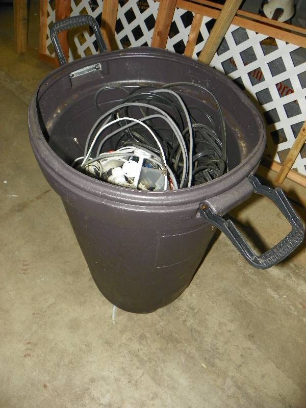 lot 13 image: Trash can with cable and lipstick cameras for a security system