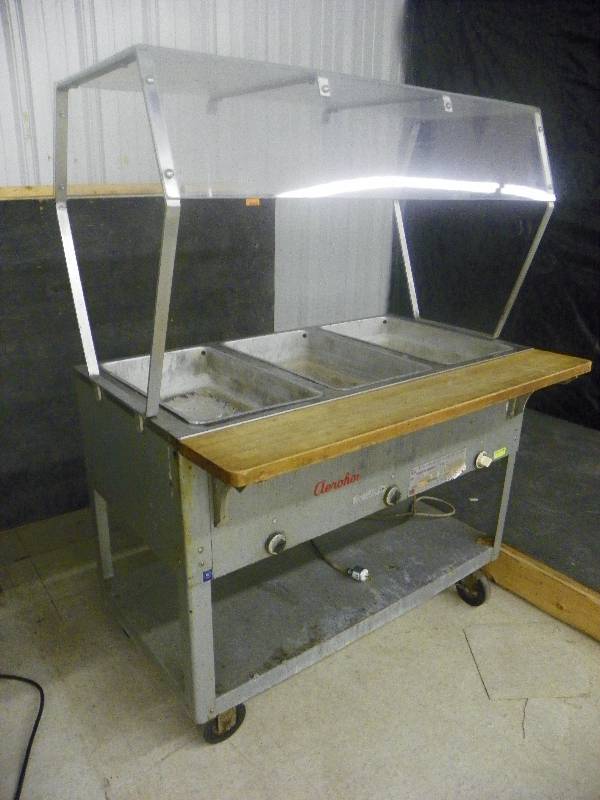 lot 73 image: Aerohot waterless food warmer, 44.5 wide  x 29.5 deep (including front board) x 59 tall.
