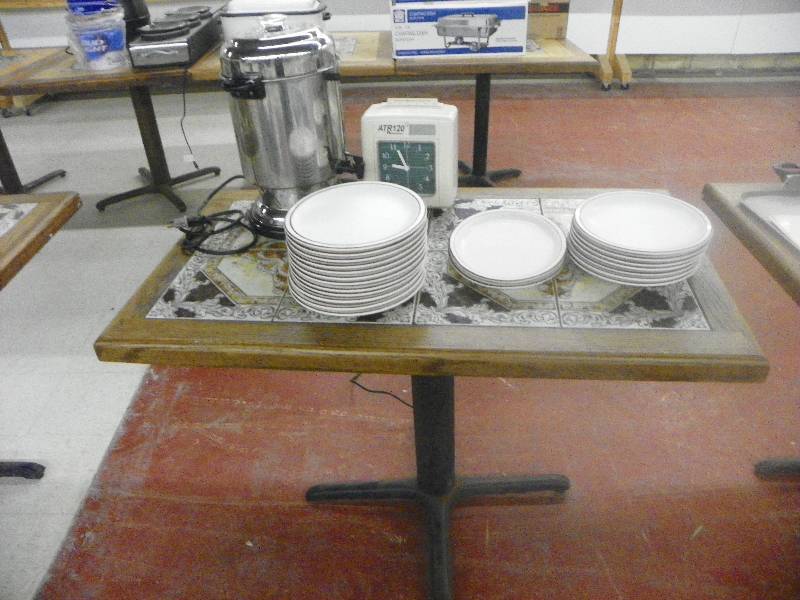lot 87 image: Table with tile inlay 46 x 26 x 31 tall, includes all the kitchen wares sitting on it See pictures