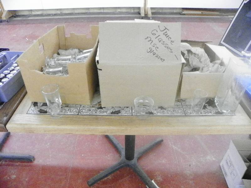 lot 92 image: Table with tile inlay 46 x 26 x 31 tall, includes all the kitchen wares sitting on it See pictures
