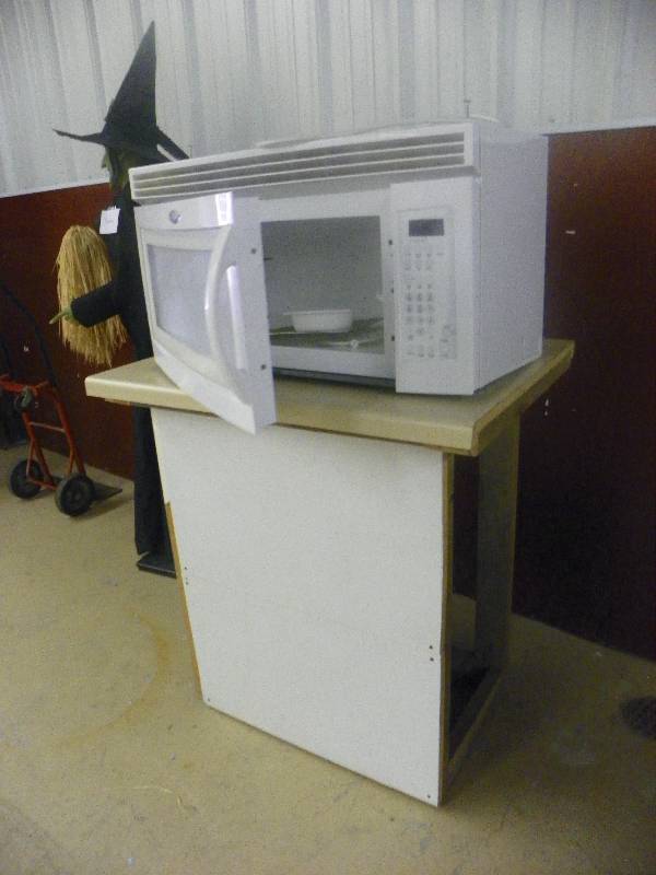 lot 100 image: Whirlpool microwave and stand