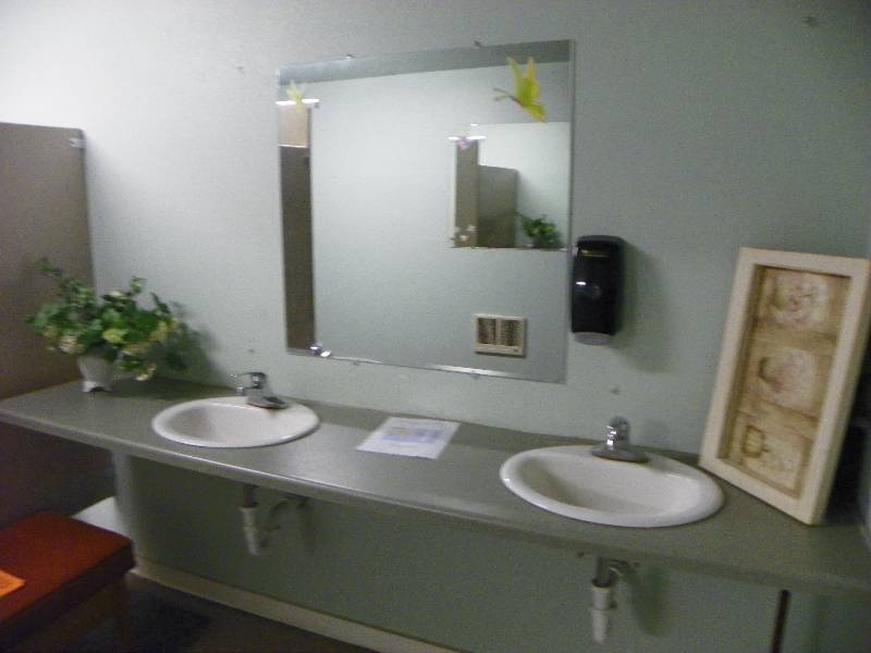 lot 144 image: Bathroom fixtures, mirror, countertop, sinks and faucets and decorations, all must be removed