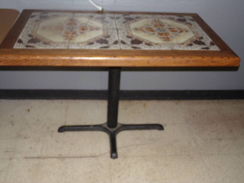 lot 176 image: Wooden Table with tile inlay, pedestal base