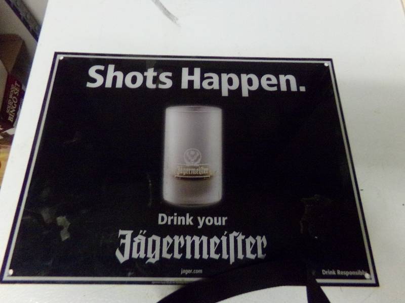 lot 200 image: Jagermeister Shots Happen Bar sign