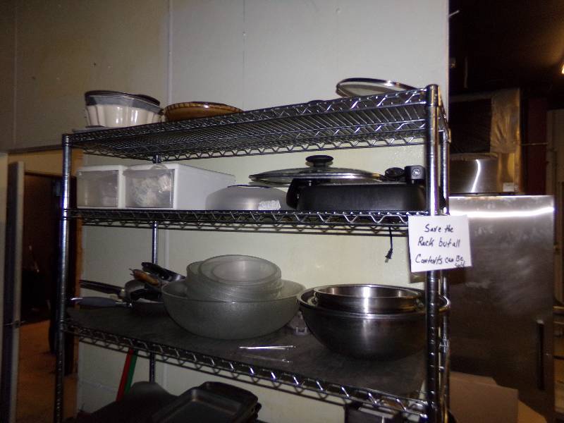 lot 228 image: Contents of the top three shelves