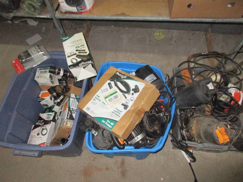3 totes of pumps and parts