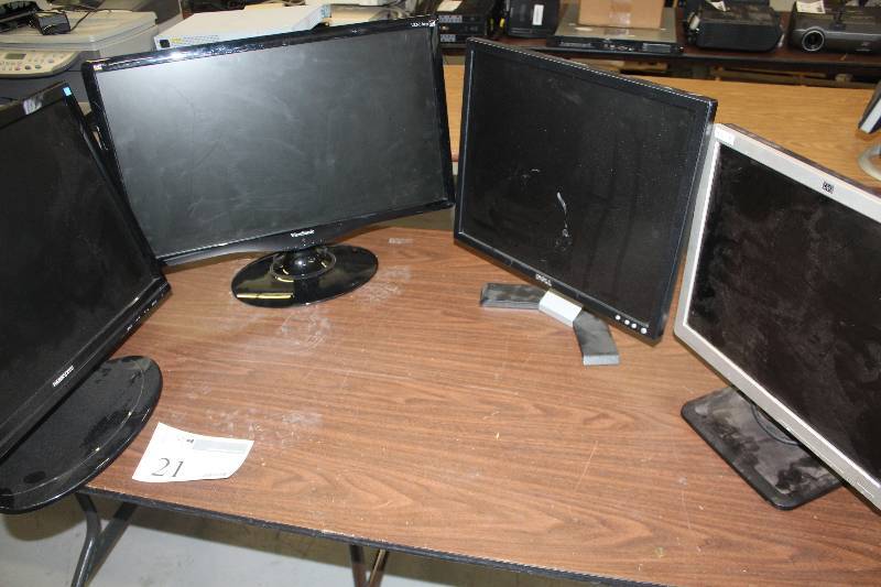 lot 21 image: Lot of (4) HannSpree,ViewSonic,Dell,HP Computer Flatscreen Monitors Includes 2) 17in AND 1) 24in. AND 1) 22in.