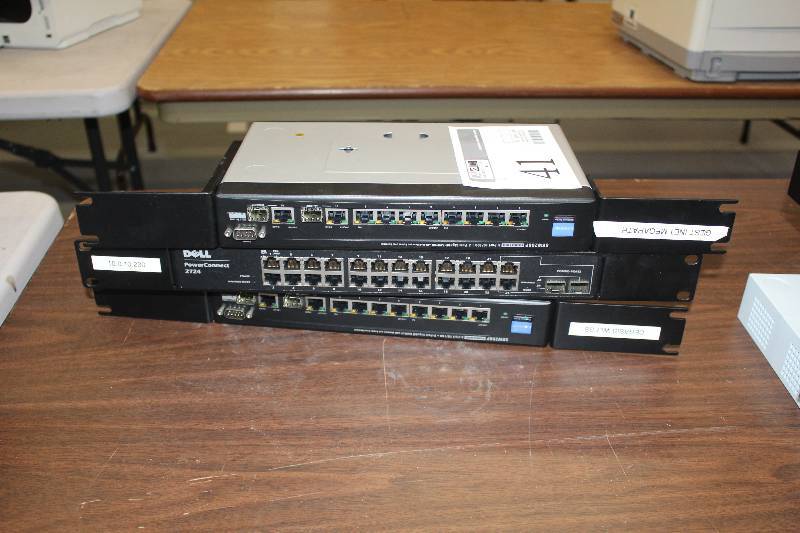 lot 41 image: Lot of (3) Rack-Mount Electronics Includes 1) Dell PowerConnect 2724 Ethernet Switch AND 2) Dell Business Series 8-Port 10100  2-Port Gigabit Switch