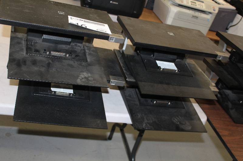 lot 46 image: Lot of (4) Dell Laptop Riser Docking Stations