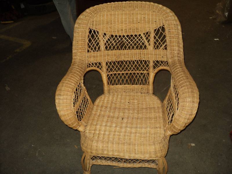 lot 24 image: wicker chair...