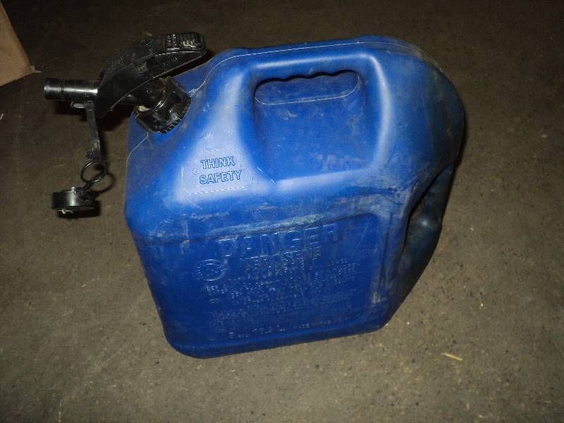 lot 26 image: 5 gallon gas can...