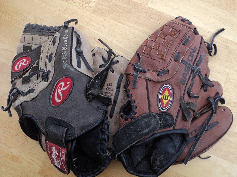 lot 61 image: 2 childrens baseball gloves...