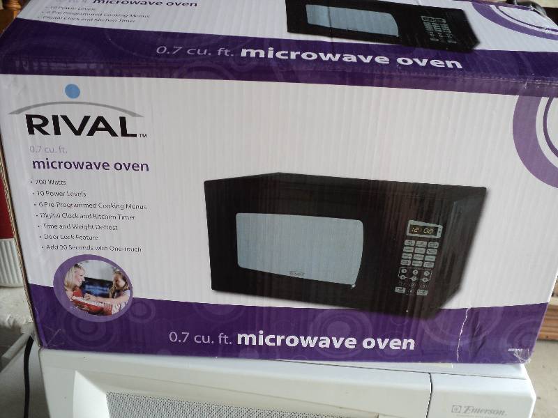 lot 67 image: brand new black Rival microwave...