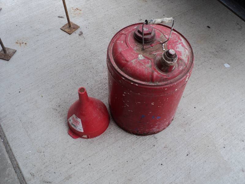 lot 70 image: gas can and funnel...
