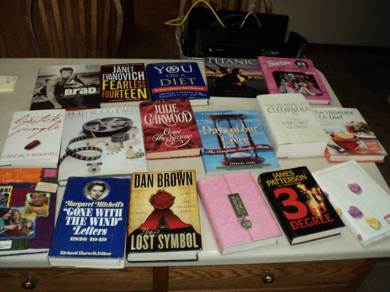 lot 88 image: tote plus hard cover books...