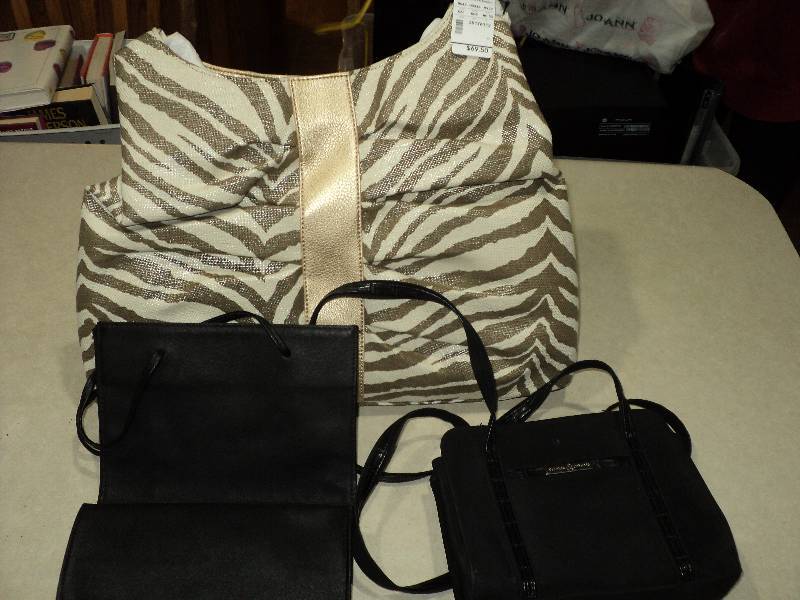 lot 101 image: 1 new purse with 2 black purses...