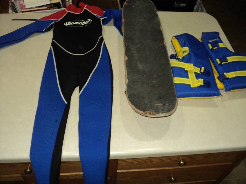 lot 108 image: lifevest, childrens size 8 wet suit...