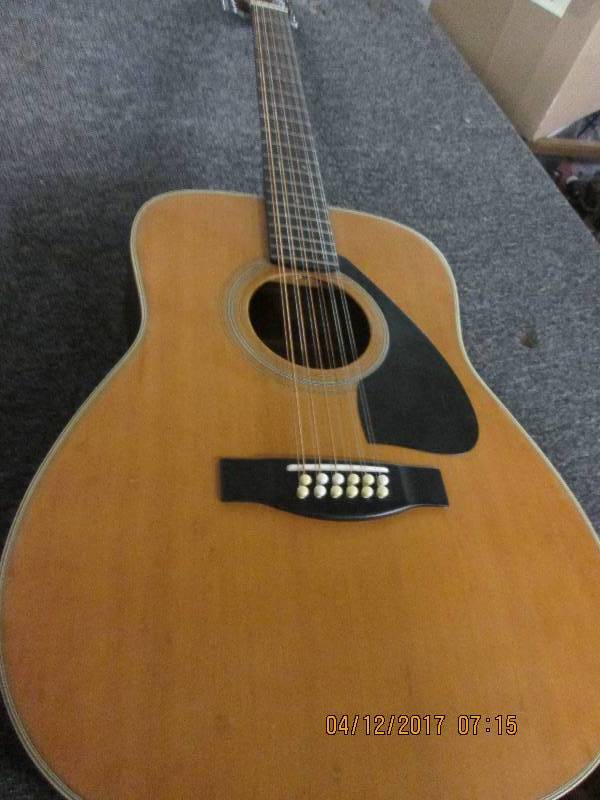 lot 201 image: Yamaha 12 string guitar looks to be...