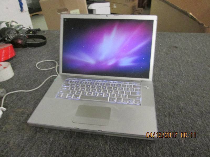 lot 208 image: apple macbook pro laptop  powers on...