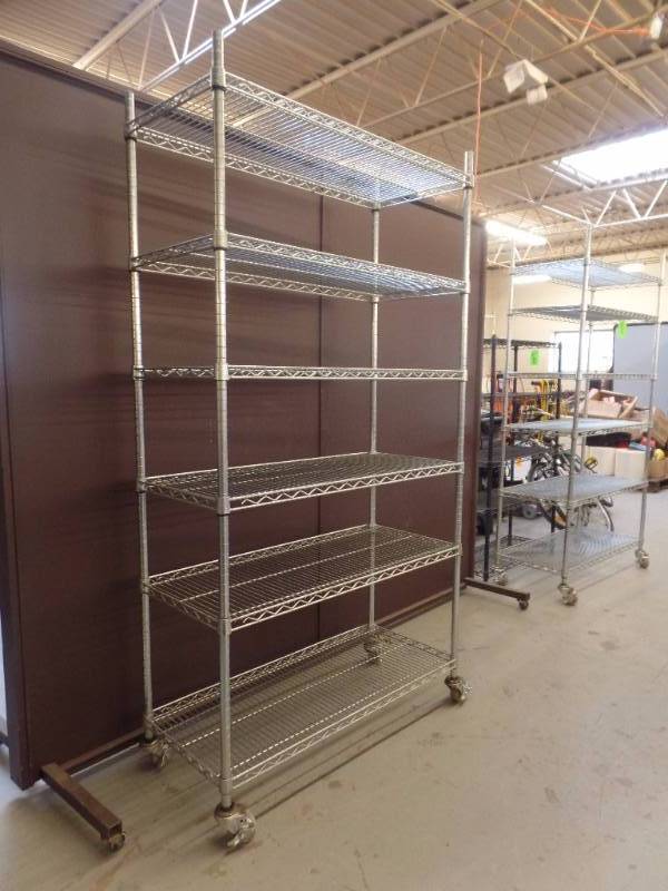 lot 605 image: STAINLESS STEEL ROLLING METRO STYLE SHELVING
