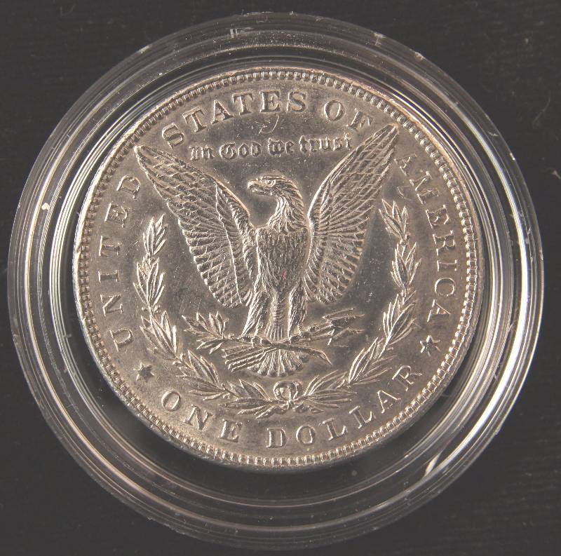 1887 MORGAN SILVER DOLLAR UNC CLEANED IN AIRTITE HOLDER