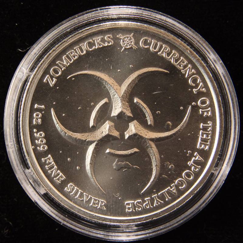1 TROY OZ. .999 FINE SILVER ZOMBUCKS THE SAINT IN AIRTITE HOLDER