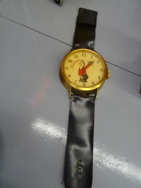 lot 31 image: Hamms Beer wall hanging clock watch...