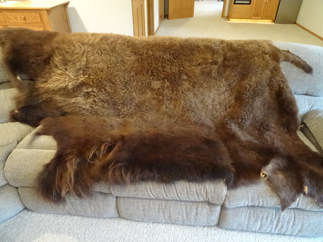 lot 91 image: Buffalo rug. 72 x 72. Professionall...