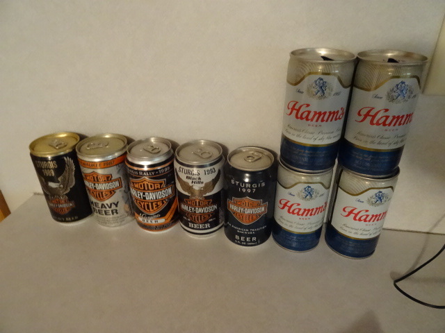 lot 93 image: 4 Hamms beer cans. 5 Harley Davidso...