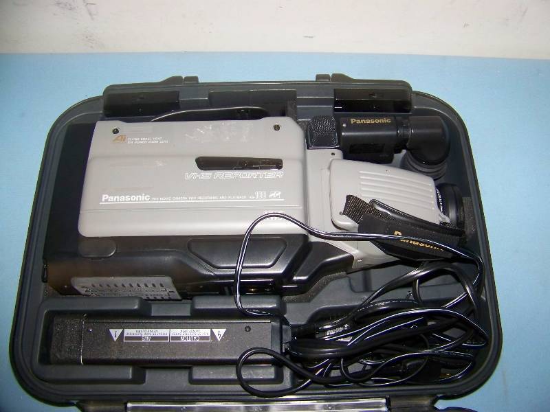 lot 114 image: Panasonic, VHS Reporter, VHS Movie Camera for Recording and Playback with AC Adapter in Hard-Sided Case