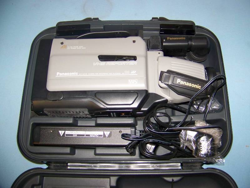 lot 115 image: Panasonic, VHS Reporter, VHS Movie Camera for Recording and Playback with AC Adapter in Hard-Sided Case
