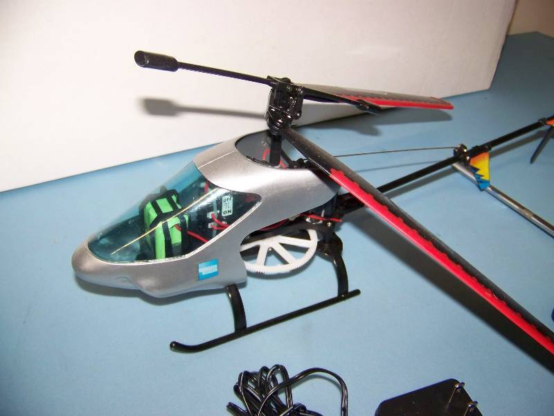 lot 149 image: Remote Control  RC Helicopter, Charger and Controller for PARTS  REPAIR in Original Box