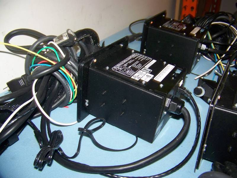 lot 103 image: (4) Extron, Hideaway Surface Accessories (HSA), Cable Cubbies with attached Cables