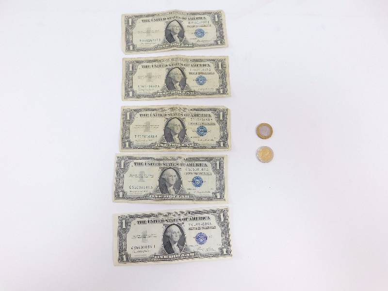 lot 22 image: 5-$1 Silver Certificates, 500 Peso Coin, $20 Jamaican Coin