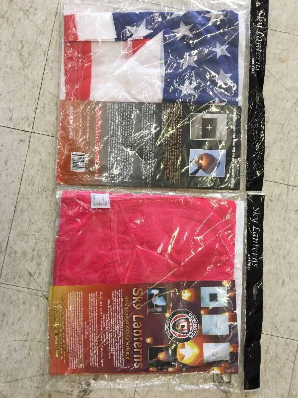 two sky lanterns  heart   and one flag