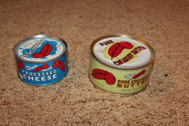lot 40 image: Red Feather 12oz. Can Pure Creamery Butter, Processed Cheese