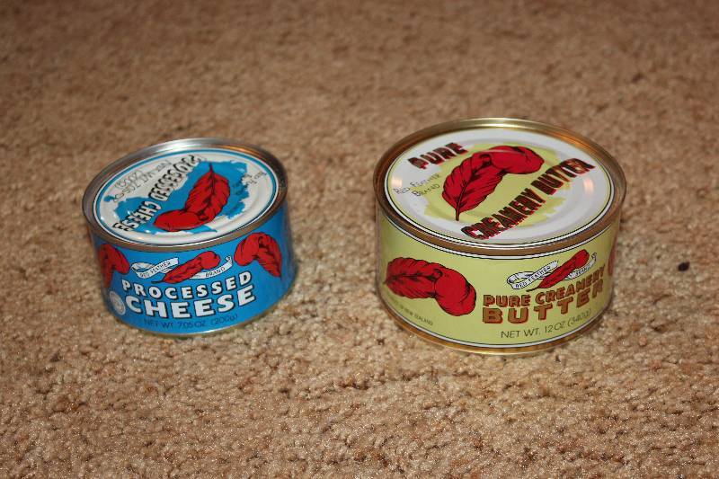 lot 41 image: Red Feather 12oz. Can Pure Creamery Butter, Processed Cheese